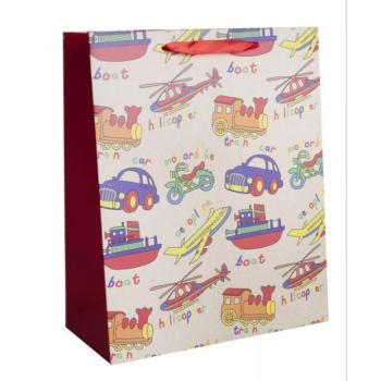 Ajándéktasak vidám járművek mintával - 18 x 23 cm kép