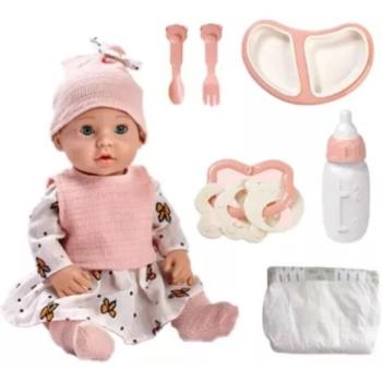 Játékbaba masnis ruhában, kiegészítőkkel kép